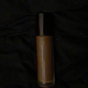 Deep bronze Becca Aqua perfecting foundation